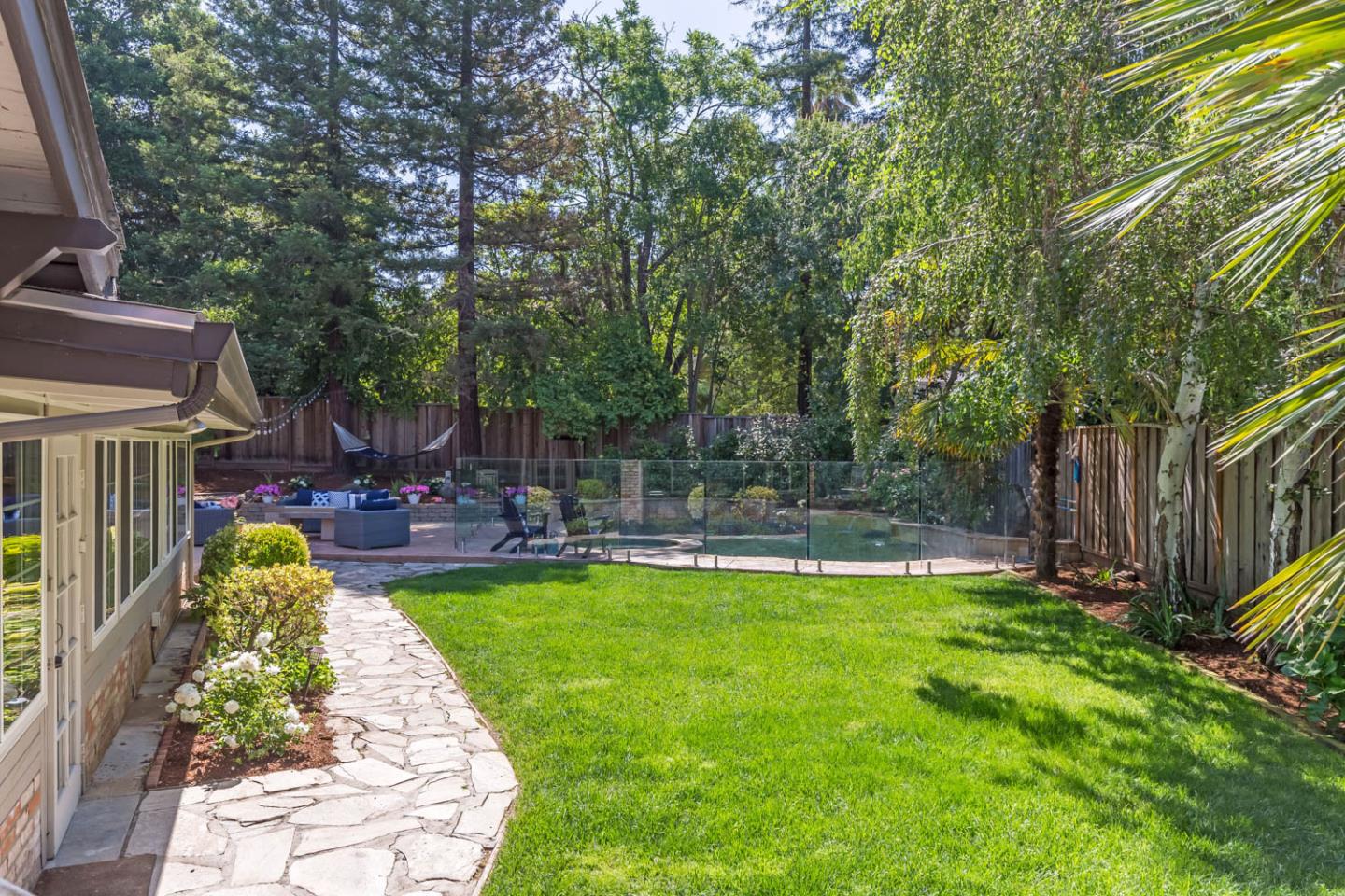 610 Magdalena Avenue Los Altos, CA 94024 - Photo 24 of 38 a view of a swimming pool with sitting area