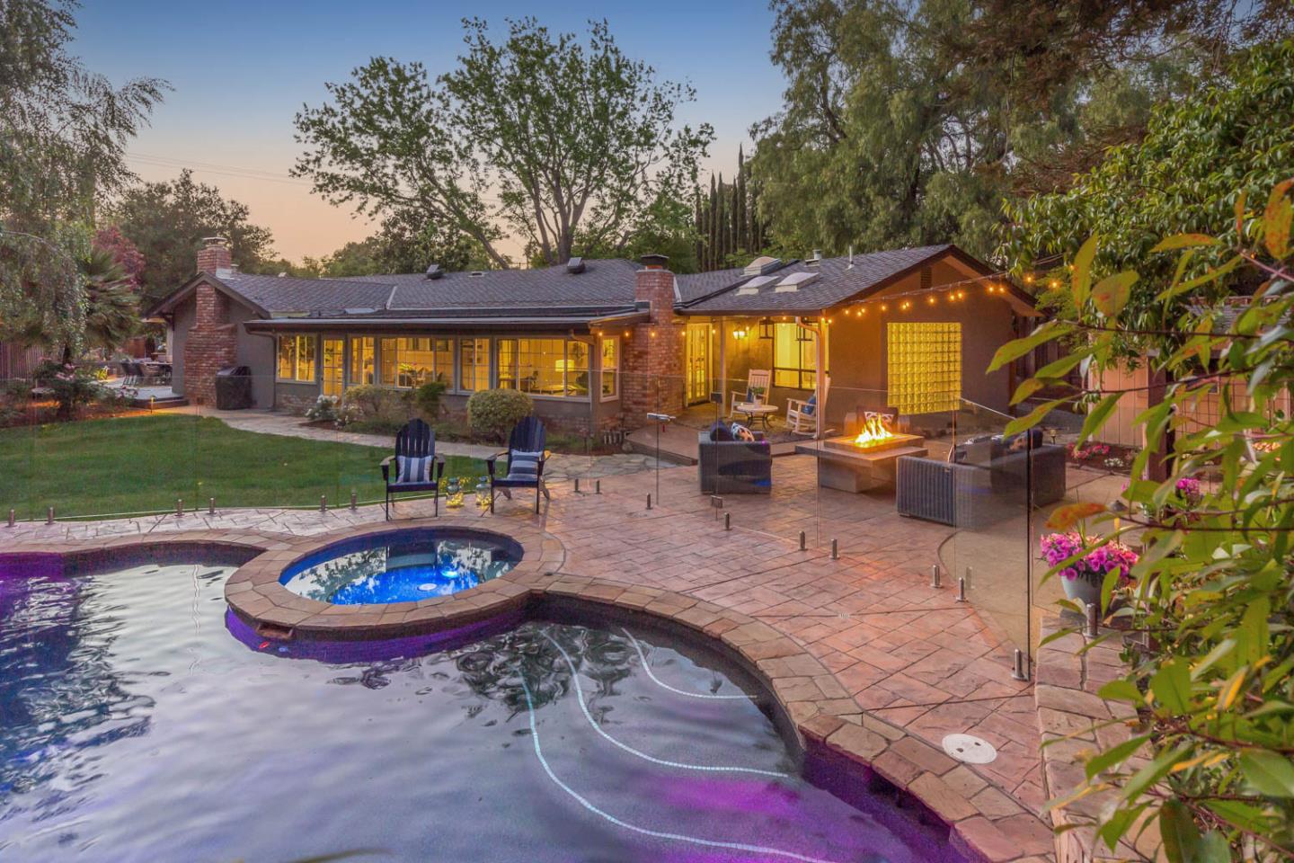 610 Magdalena Avenue Los Altos, CA 94024 - Photo 30 of 38 a swimming pool with outdoor seating and yard