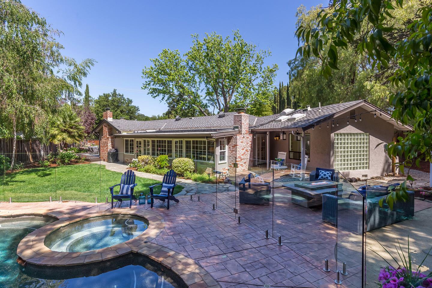 610 Magdalena Avenue Los Altos, CA 94024 - Photo 33 of 38 a view of a house with backyard sitting area and garden