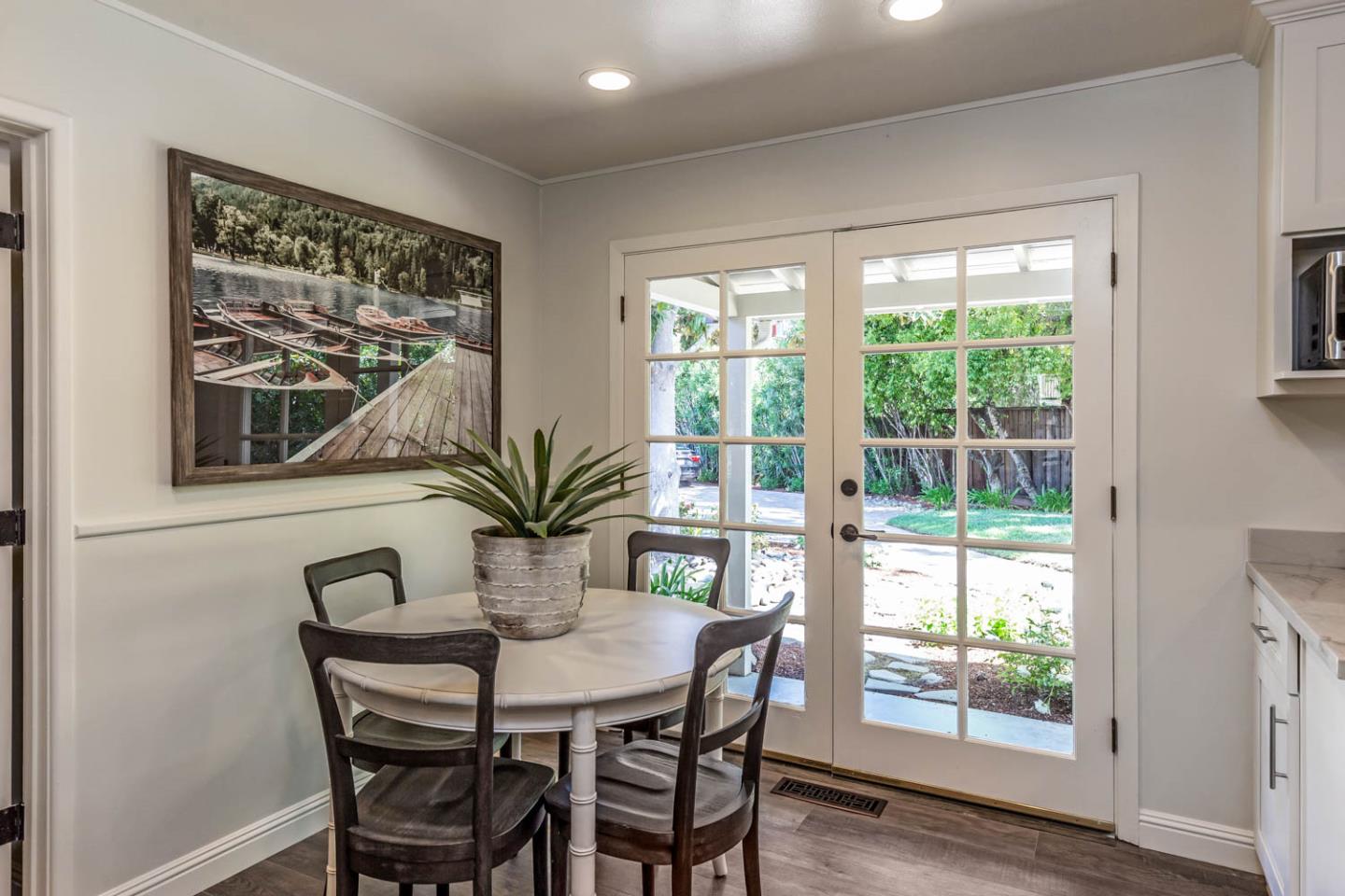 610 Magdalena Avenue Los Altos, CA 94024 - Photo 7 of 38 a view of a dining room with furniture window and wooden floor