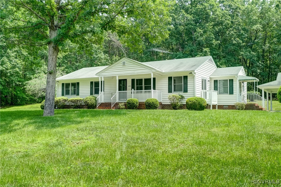 3175 Sandy Hook Road Sandy Hook, VA 23153 - Photo 2 of 27 a front view of a house with a yard