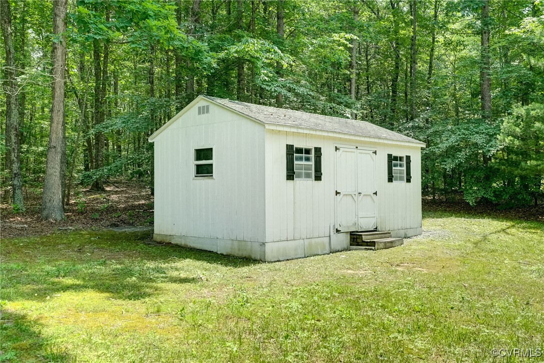 3175 Sandy Hook Road Sandy Hook, VA 23153 - Photo 25 of 27 a view of a backyard