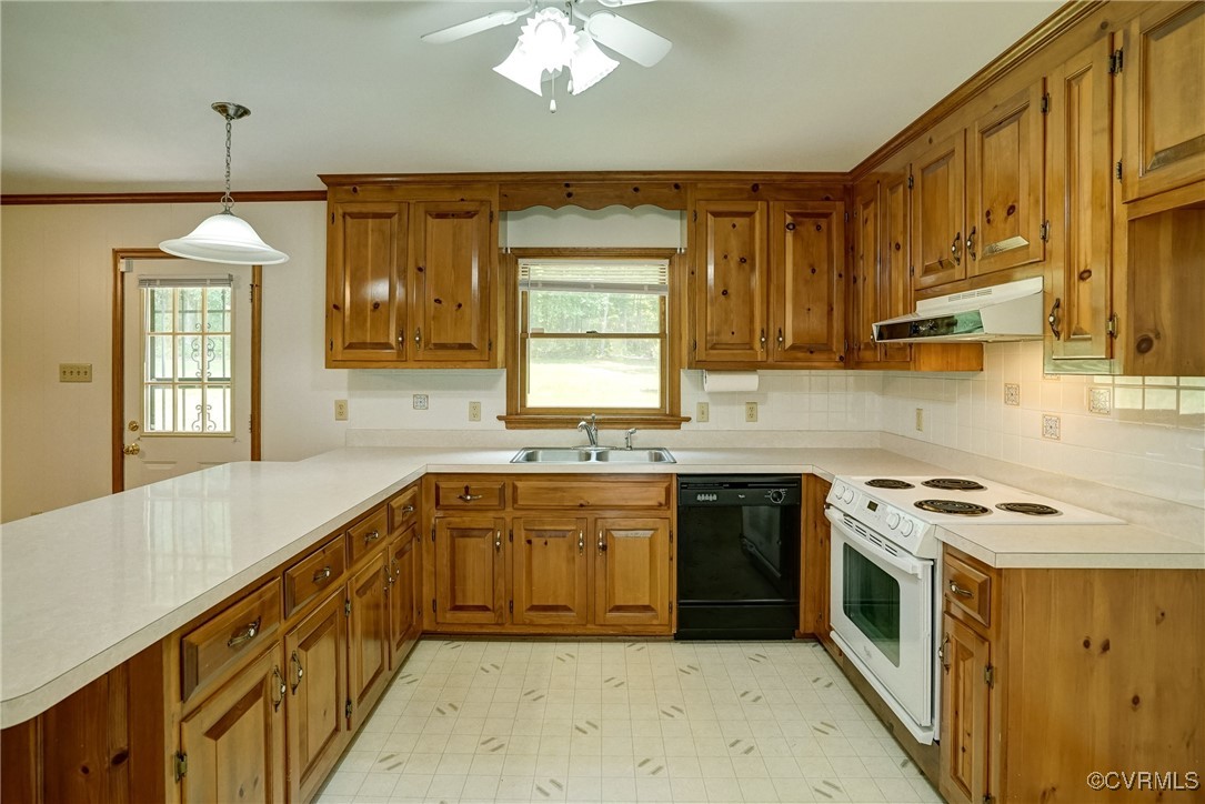 3175 Sandy Hook Road Sandy Hook, VA 23153 - Photo 10 of 27 a kitchen with a sink stove and cabinets