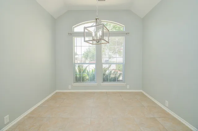 an empty room with windows view and window