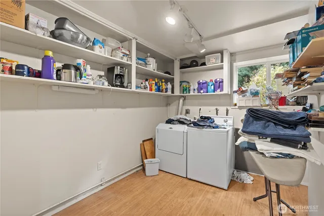 a utility room with washer and dryer