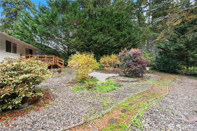 a backyard of a house with lots of green space