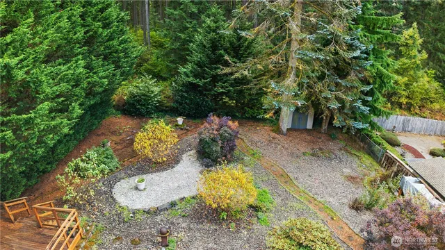 a view of a backyard of the house