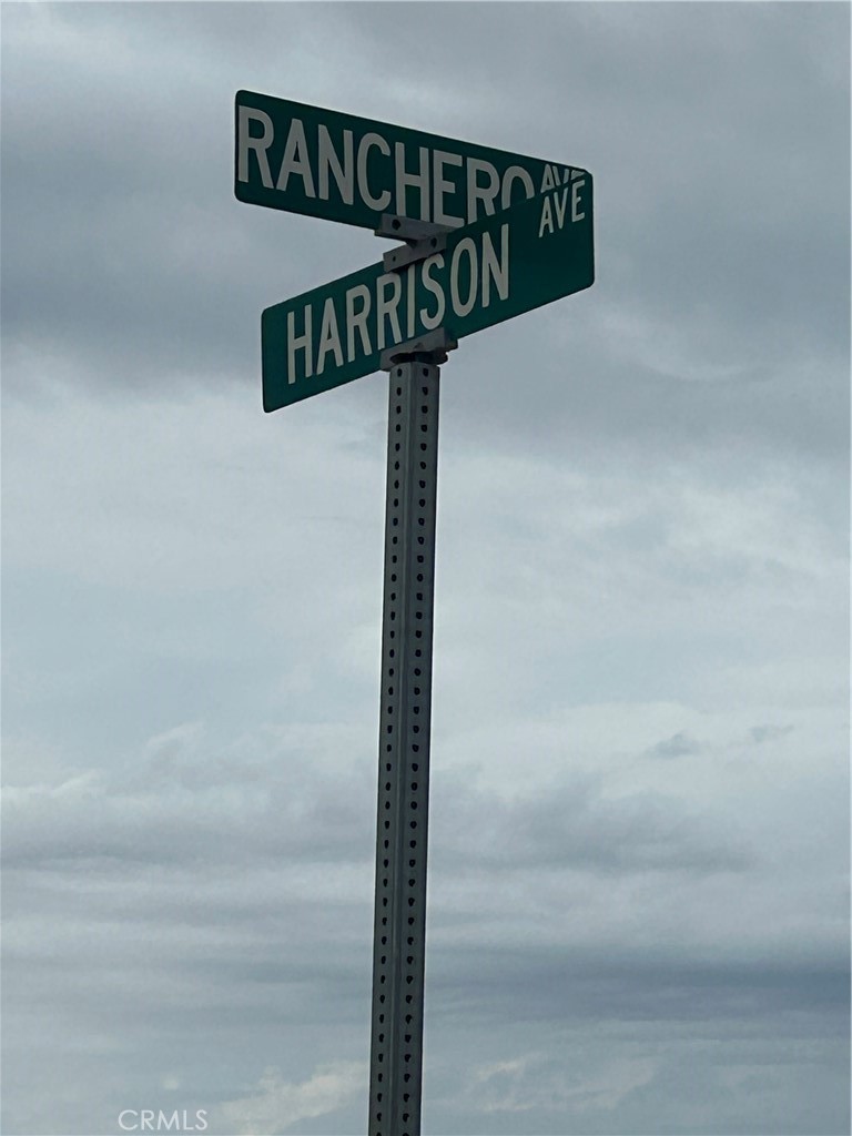 2040 Ranchero Avenue Salton City, CA 92274 - Photo 2 of 5 a street sign that is on a pole