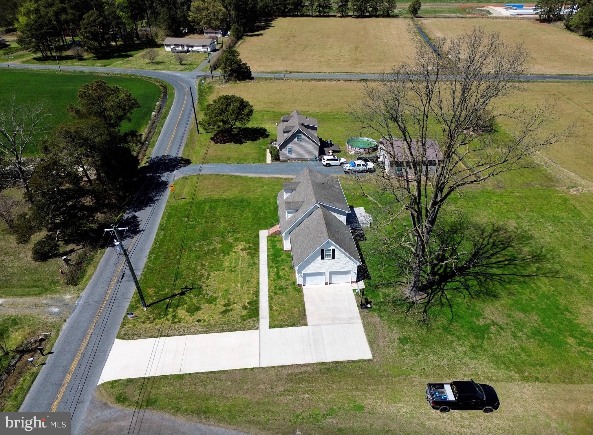 4810 Jacksonville Road Crisfield, MD 21817 - Photo 11 of 38 an aerial view of a house with outdoor space pool seating area and yard