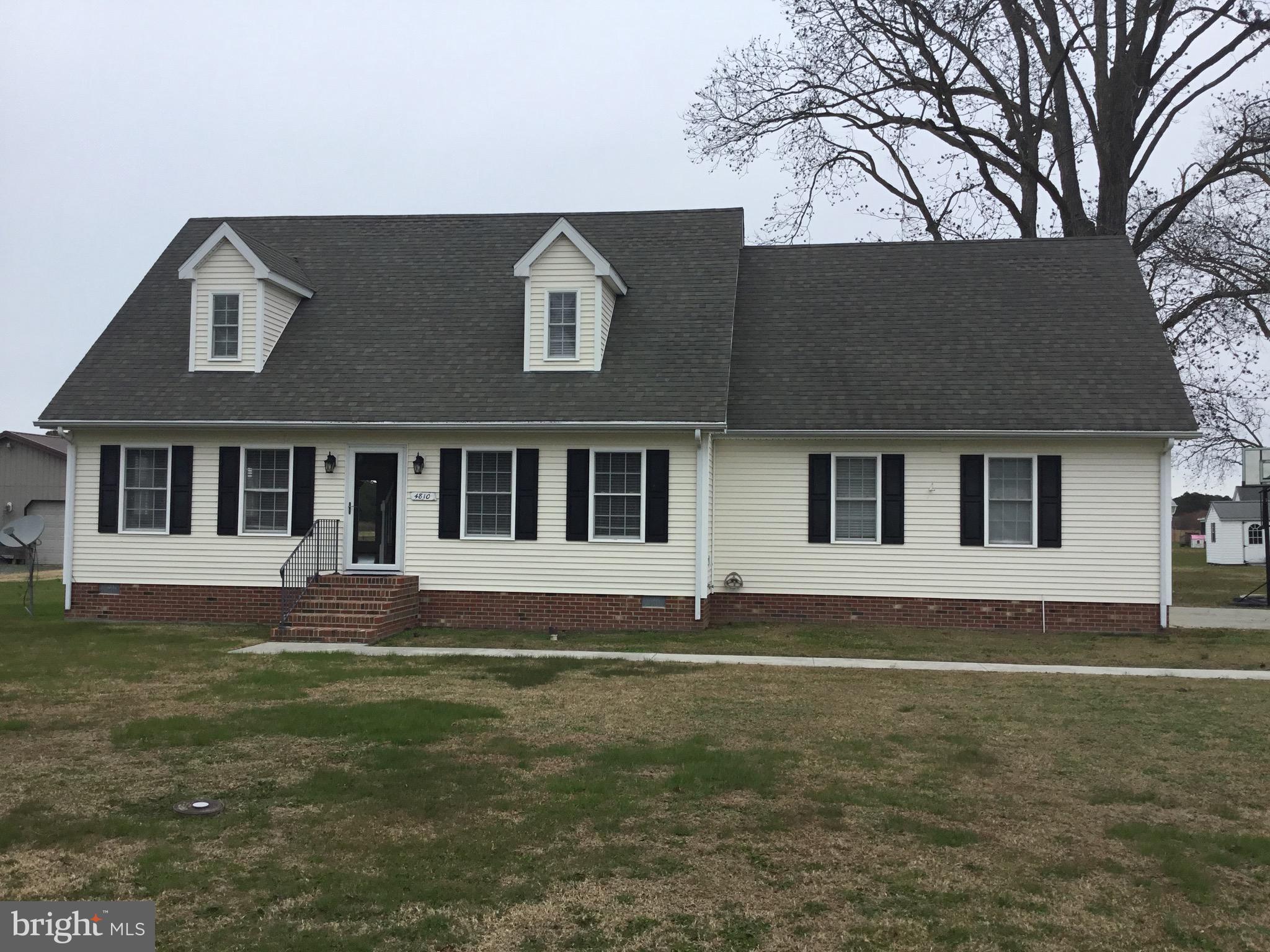 4810 Jacksonville Road Crisfield, MD 21817 - Photo 2 of 38 a house that has a big yard in front of it