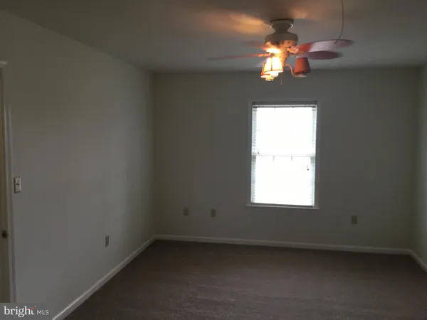 a view of a windows and chandelier in a room