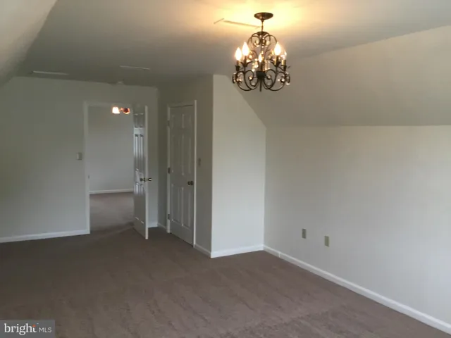 a view of a chandelier in big room