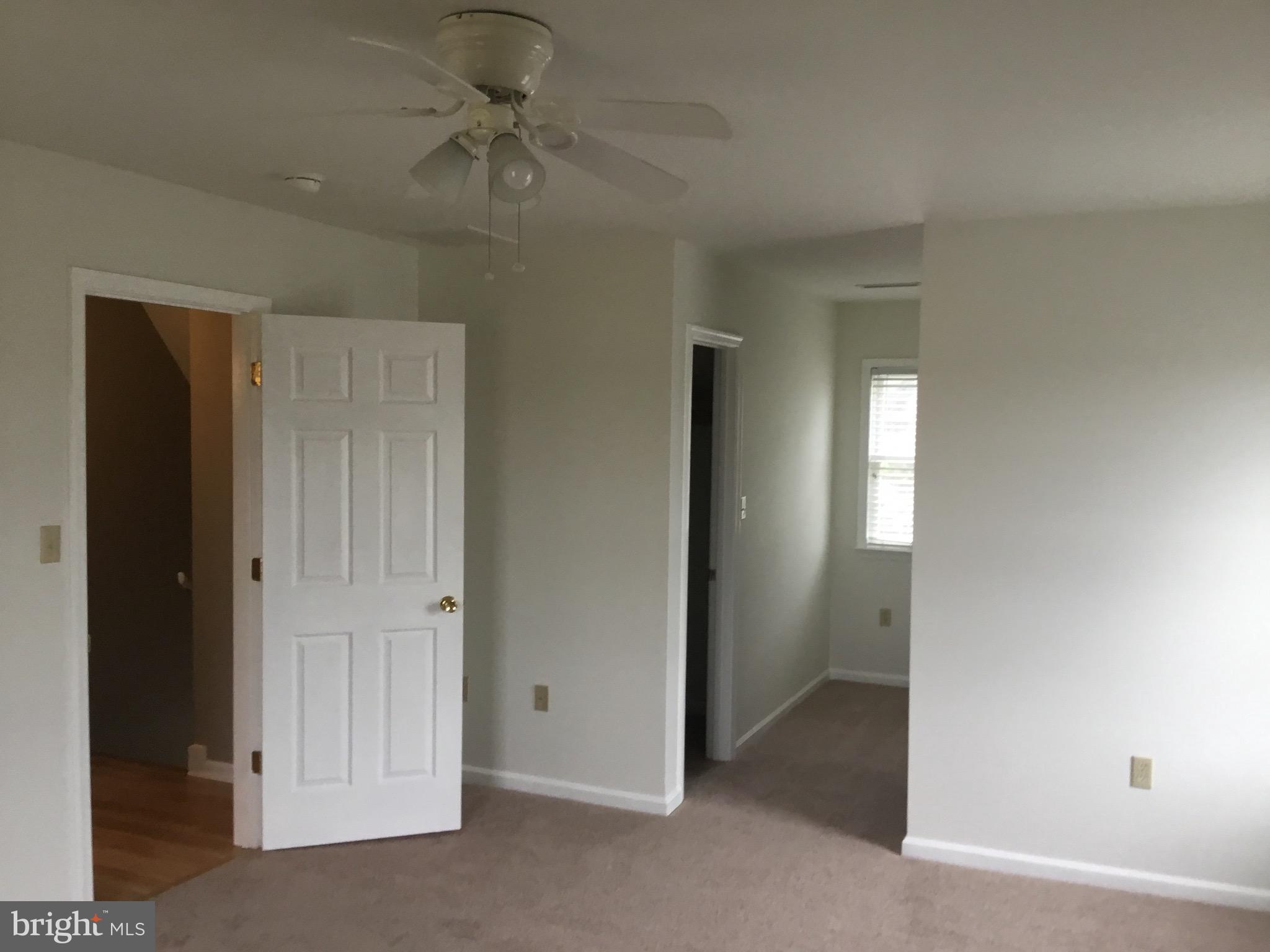 4810 Jacksonville Road Crisfield, MD 21817 - Photo 29 of 38 a view of an empty room with a window