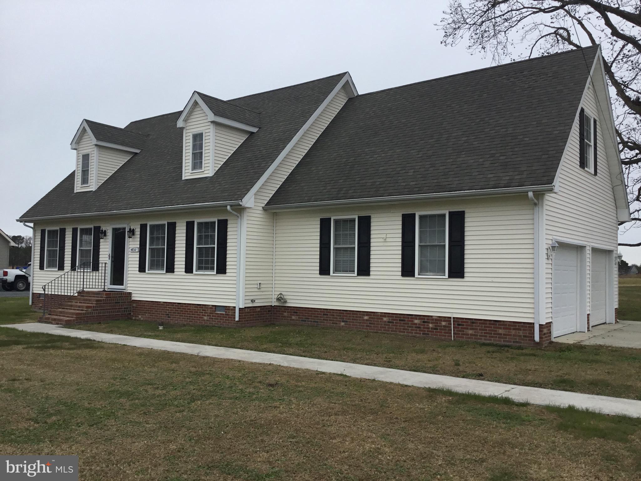 4810 Jacksonville Road Crisfield, MD 21817 - Photo 4 of 38 a front view of a house with a yard