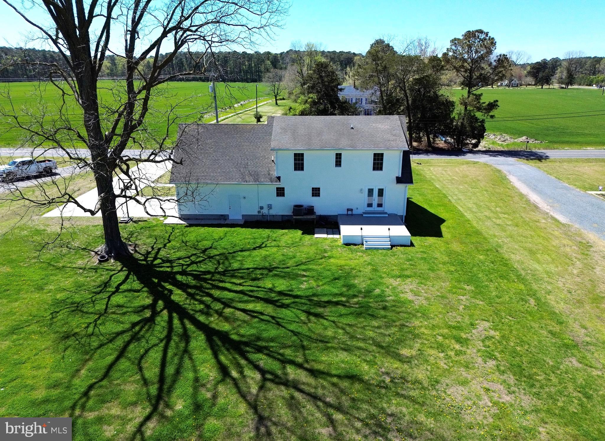 4810 Jacksonville Road Crisfield, MD 21817 - Photo 8 of 38 an aerial view of a house with a garden