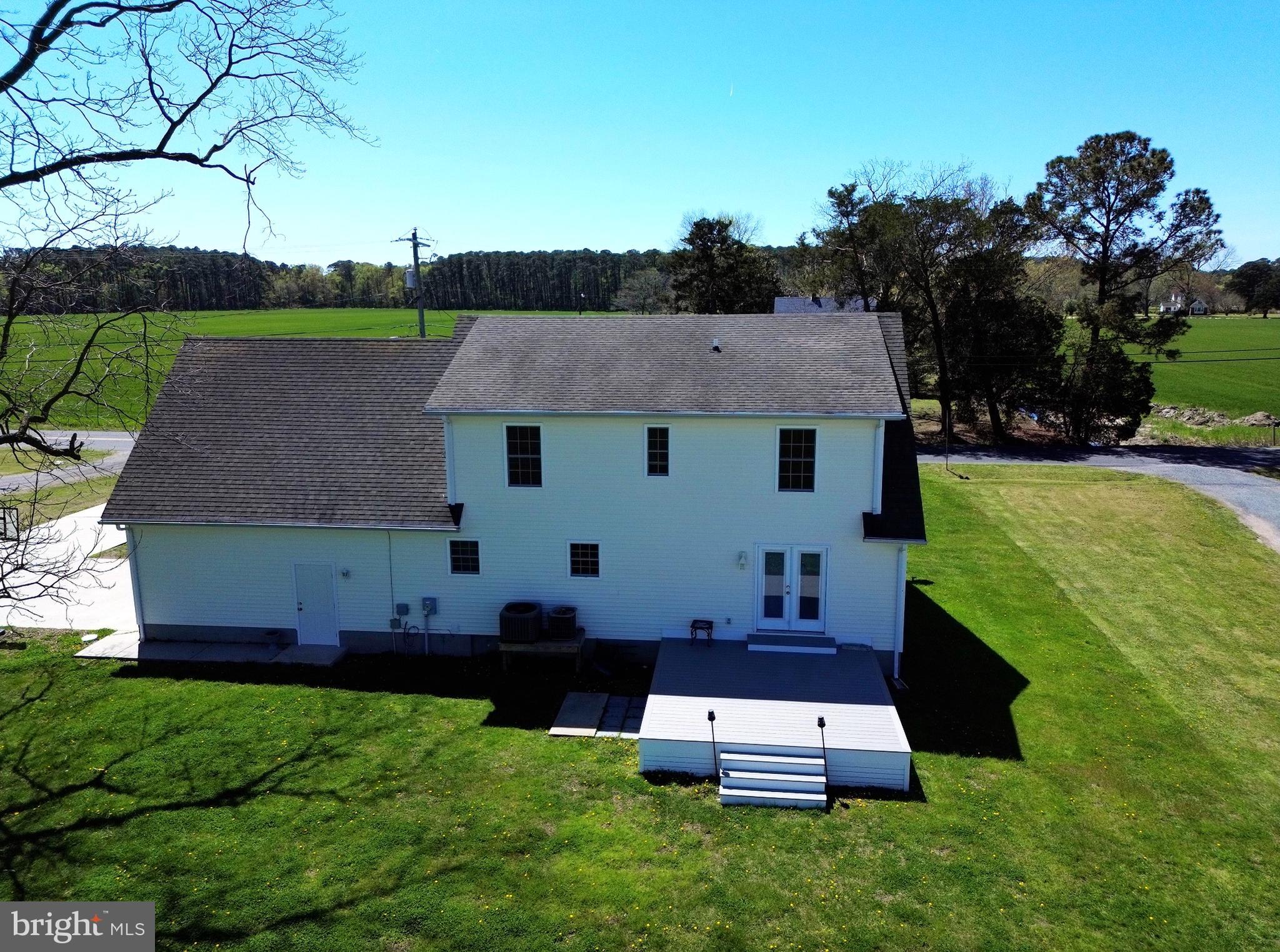 4810 Jacksonville Road Crisfield, MD 21817 - Photo 9 of 38 a aerial view of a house with garden space and a patio