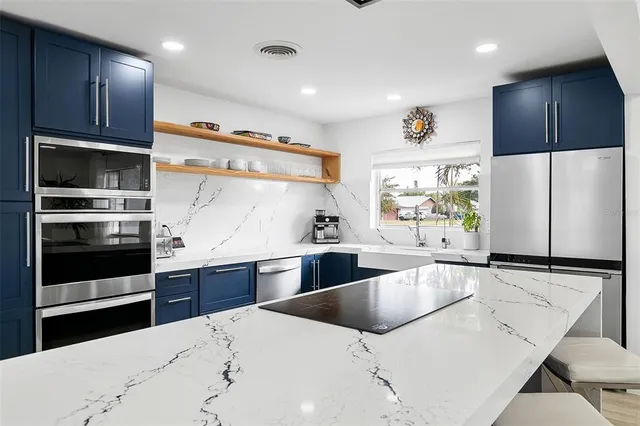 a view of swimming pool with an outdoor space and seating area