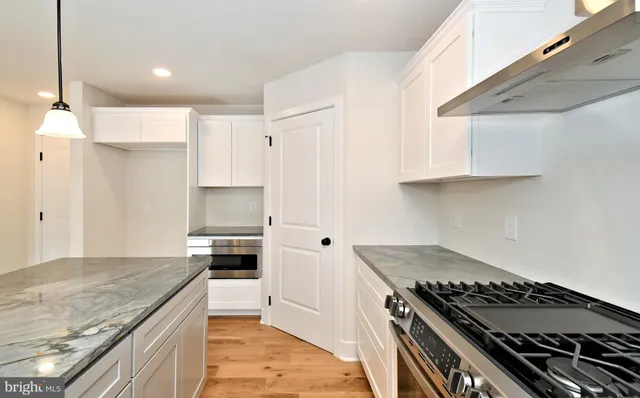 a very nice looking living room with a large window