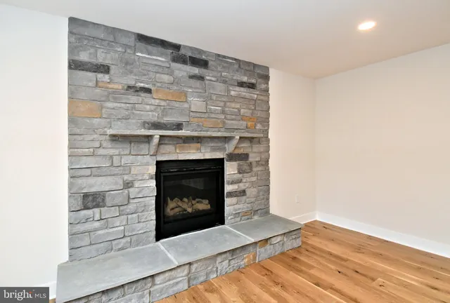 a view of a bathroom with a tub and shower
