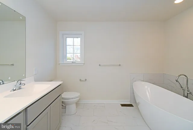 a fire hydrant in the middle of a field