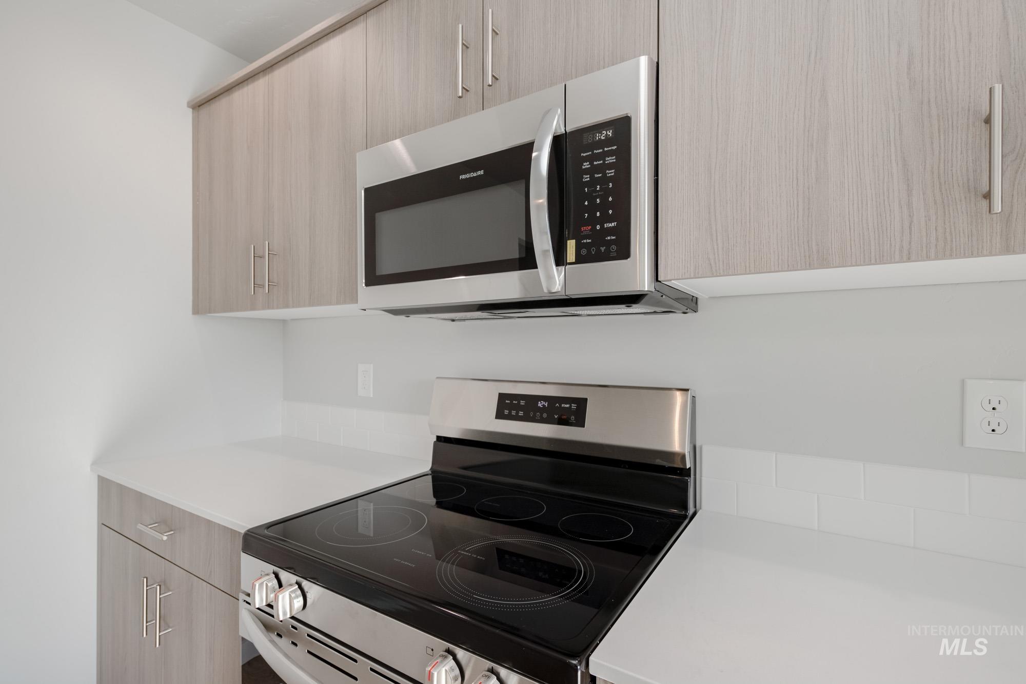 229 Moose Street Horseshoe Bend, ID 83629 - Photo 5 of 27 Kitchen featuring appliances with stainless steel finishes, modern cabinets, and light brown cabinets