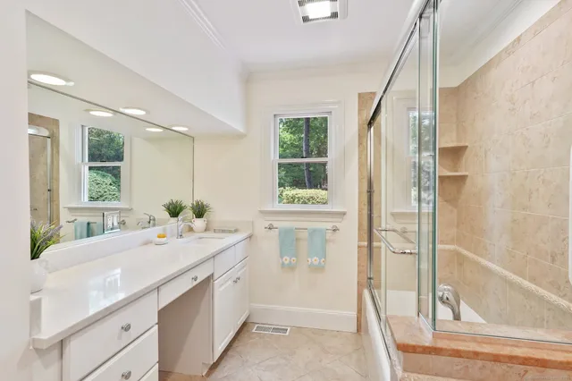 a bathroom with a sink and a bathtub