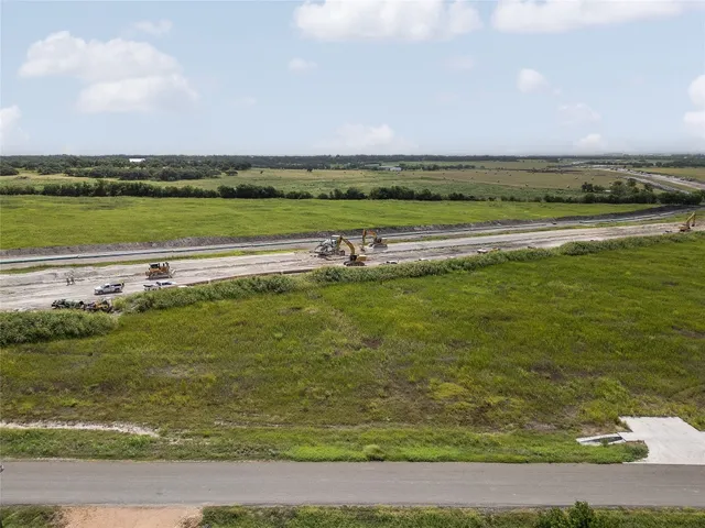 a view of a lake with a big yard