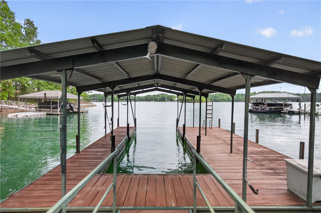 304 Lakeside Drive Seneca, SC 29672 - Photo 2 of 49 A private boat dock and covered slip provides seamless waterfront living.