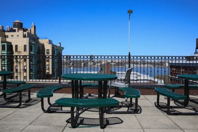 a view of a chairs and table in patio