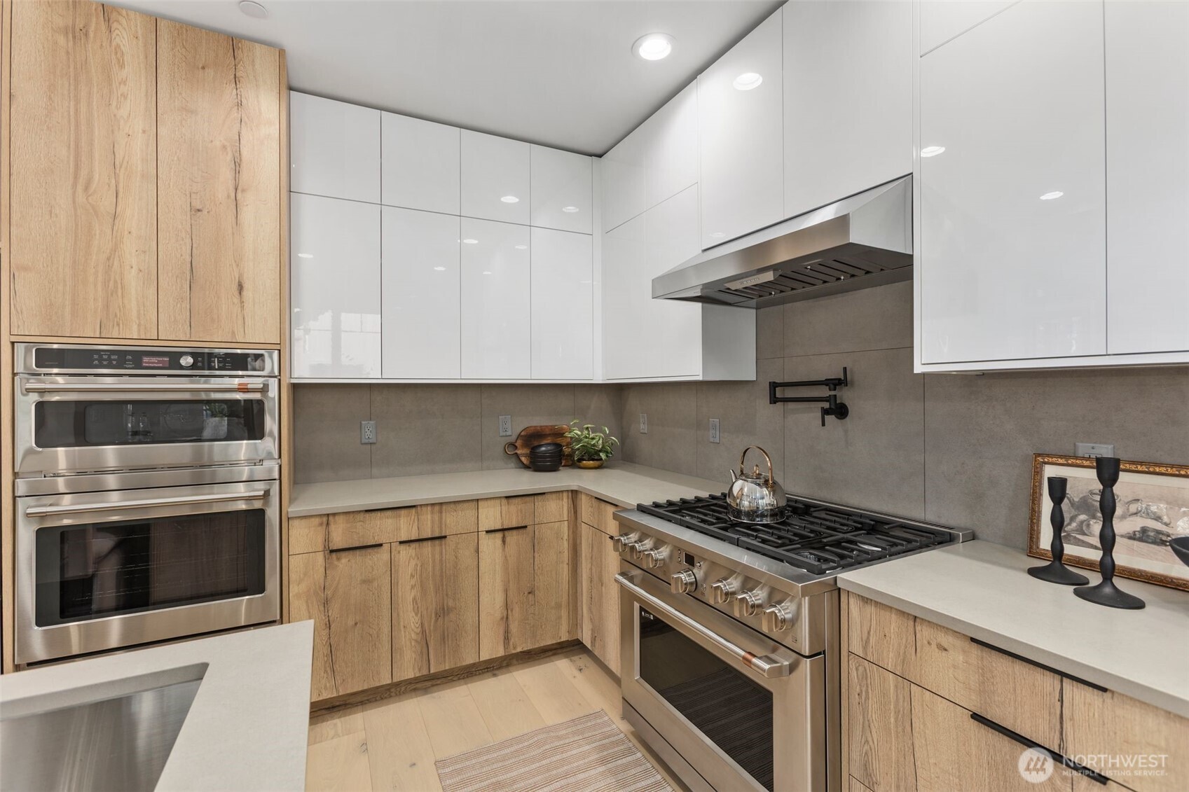 90 Portal Cle Elum, WA 98922 - Photo 11 of 38 a kitchen with stainless steel appliances a stove and white cabinets
