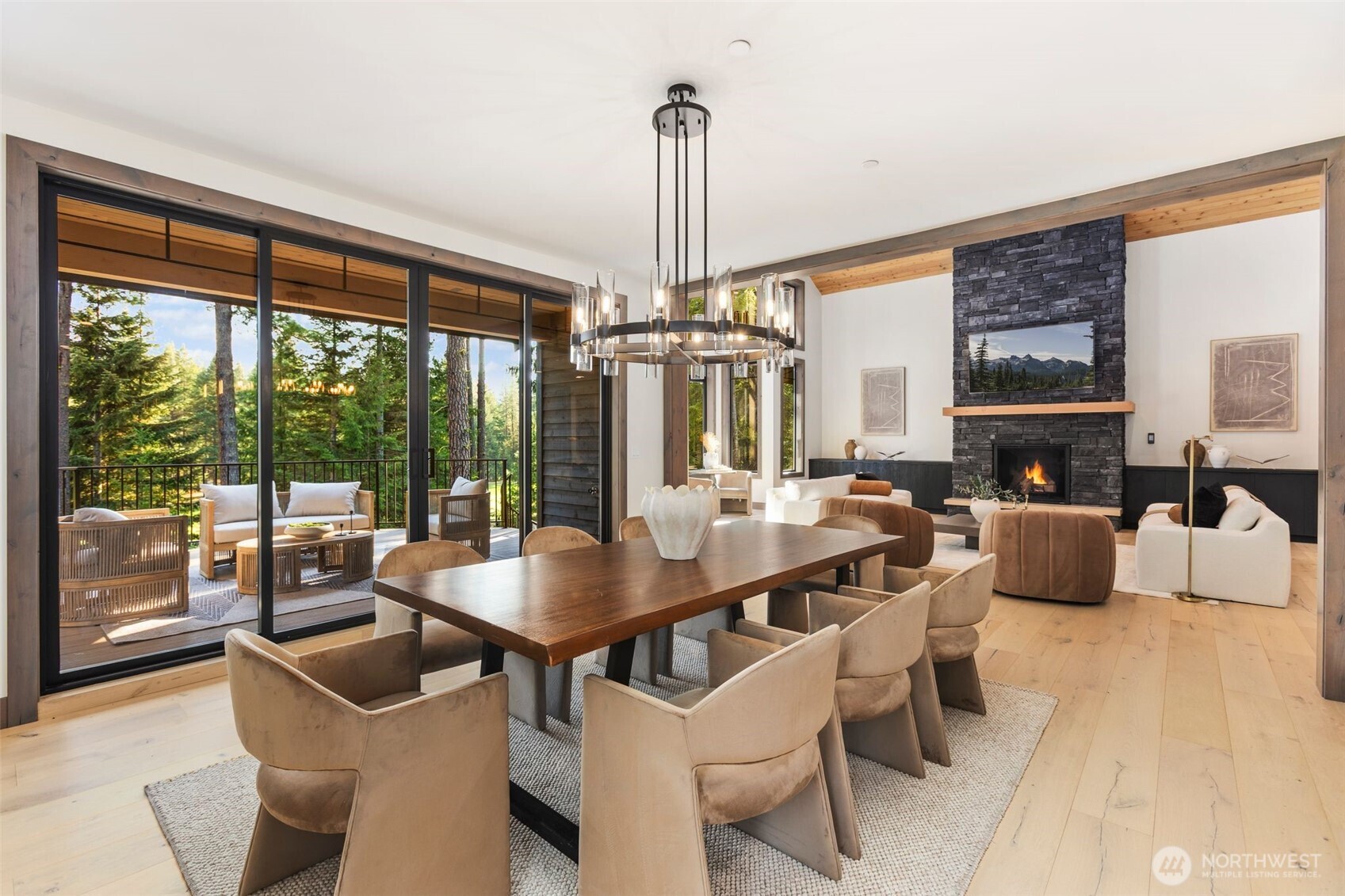 90 Portal Cle Elum, WA 98922 - Photo 14 of 38 a view of a dining room with furniture large windows and wooden floor