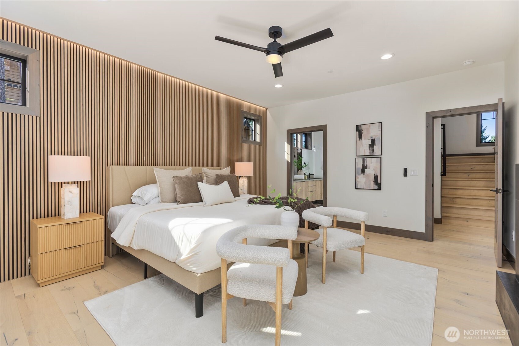 90 Portal Cle Elum, WA 98922 - Photo 19 of 38 a bedroom with a bed and a chandelier