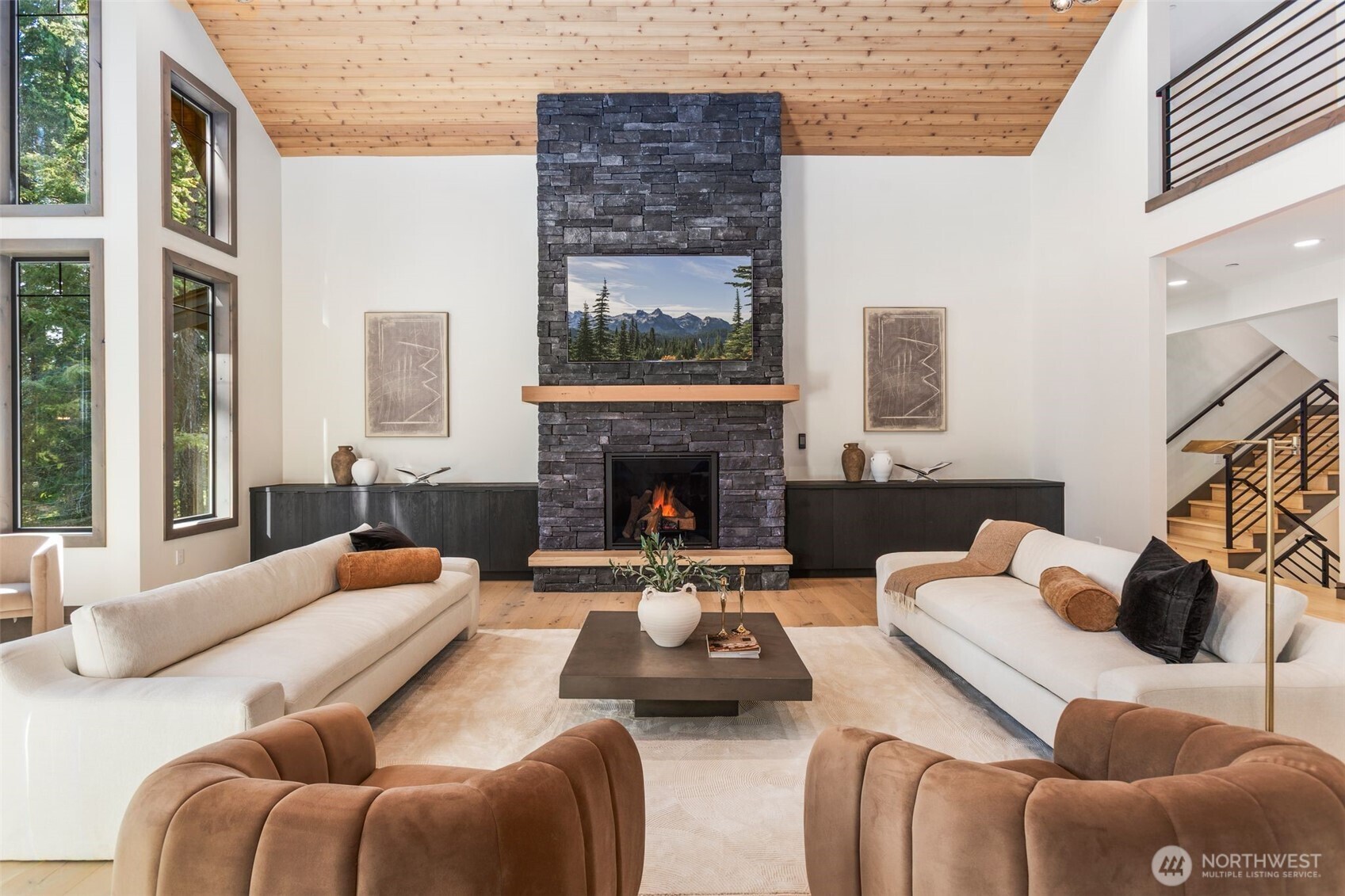 90 Portal Cle Elum, WA 98922 - Photo 5 of 38 a living room with furniture a fireplace and a large window