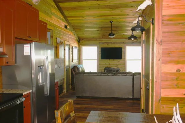 a view of a living room with a wooden floors