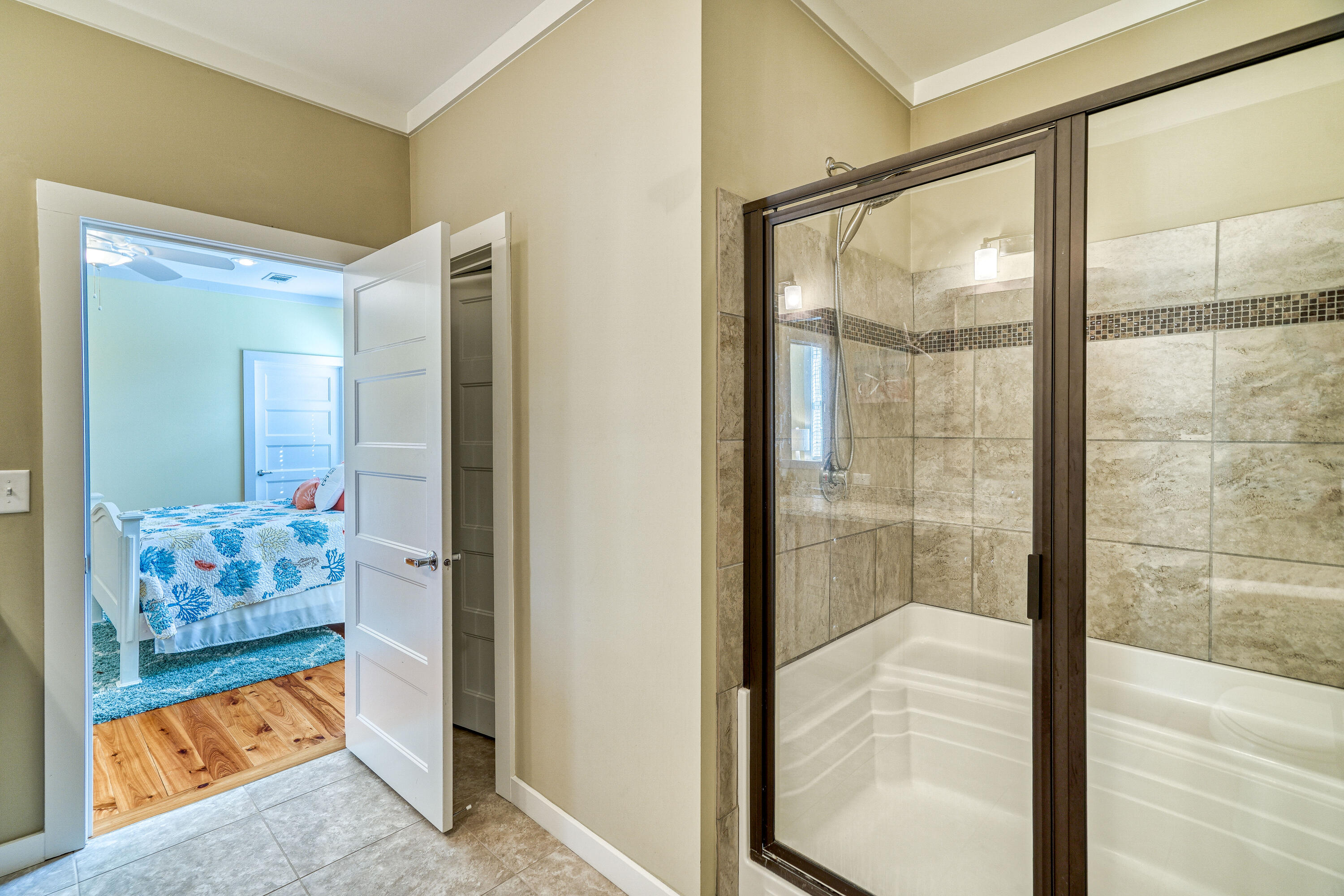 195 Maple Street Santa Rosa Beach, FL 32459 - Photo 12 of 29 a bathroom with a tub and shower