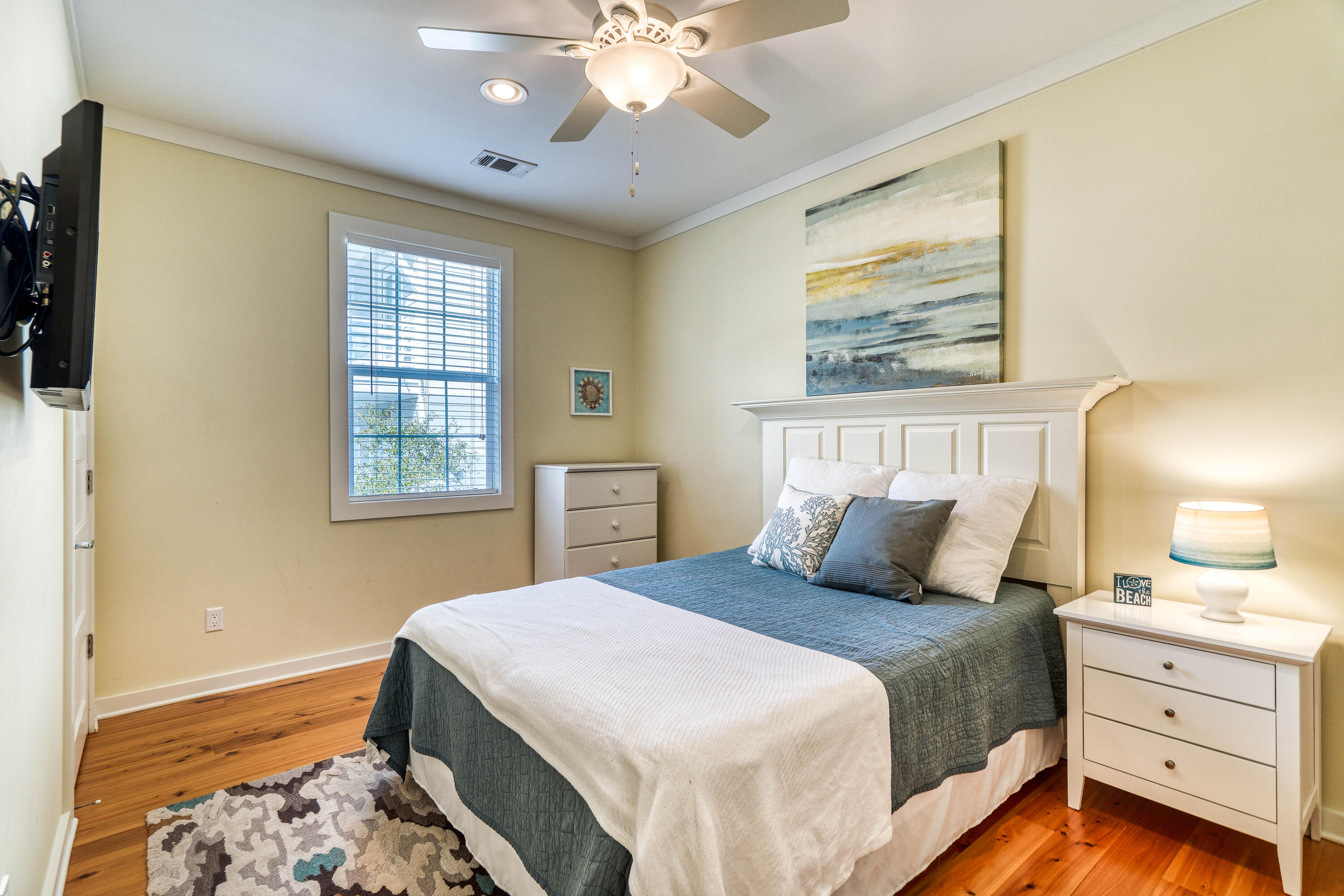 195 Maple Street Santa Rosa Beach, FL 32459 - Photo 18 of 29 a bedroom with a large bed and a window