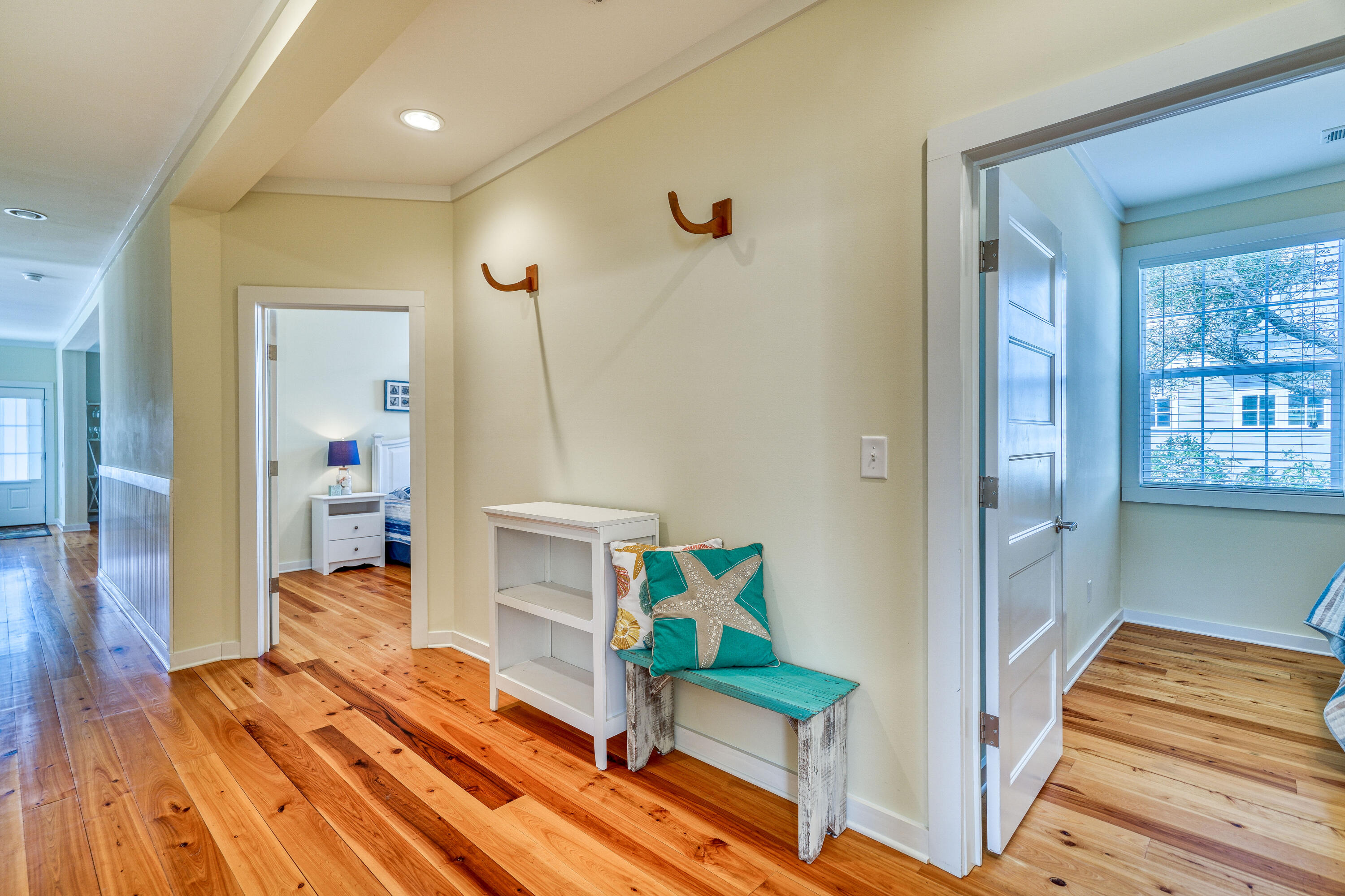195 Maple Street Santa Rosa Beach, FL 32459 - Photo 20 of 29 a room with wooden floor and furniture