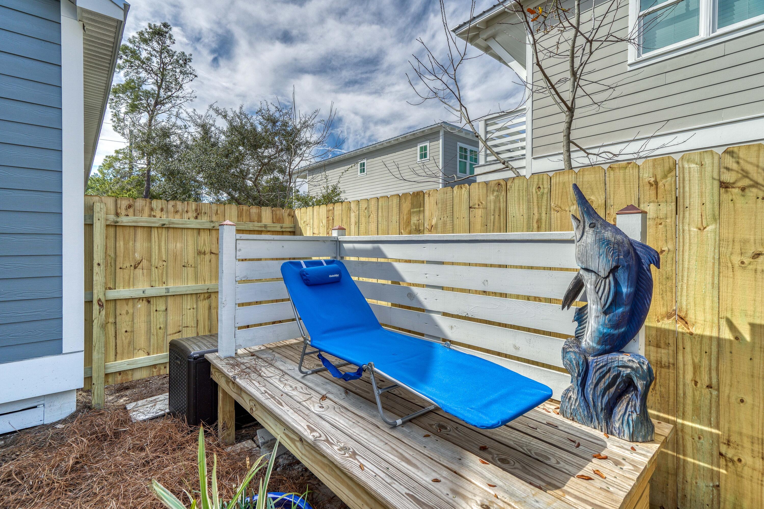 195 Maple Street Santa Rosa Beach, FL 32459 - Photo 26 of 29 a view of a chairs in a patio