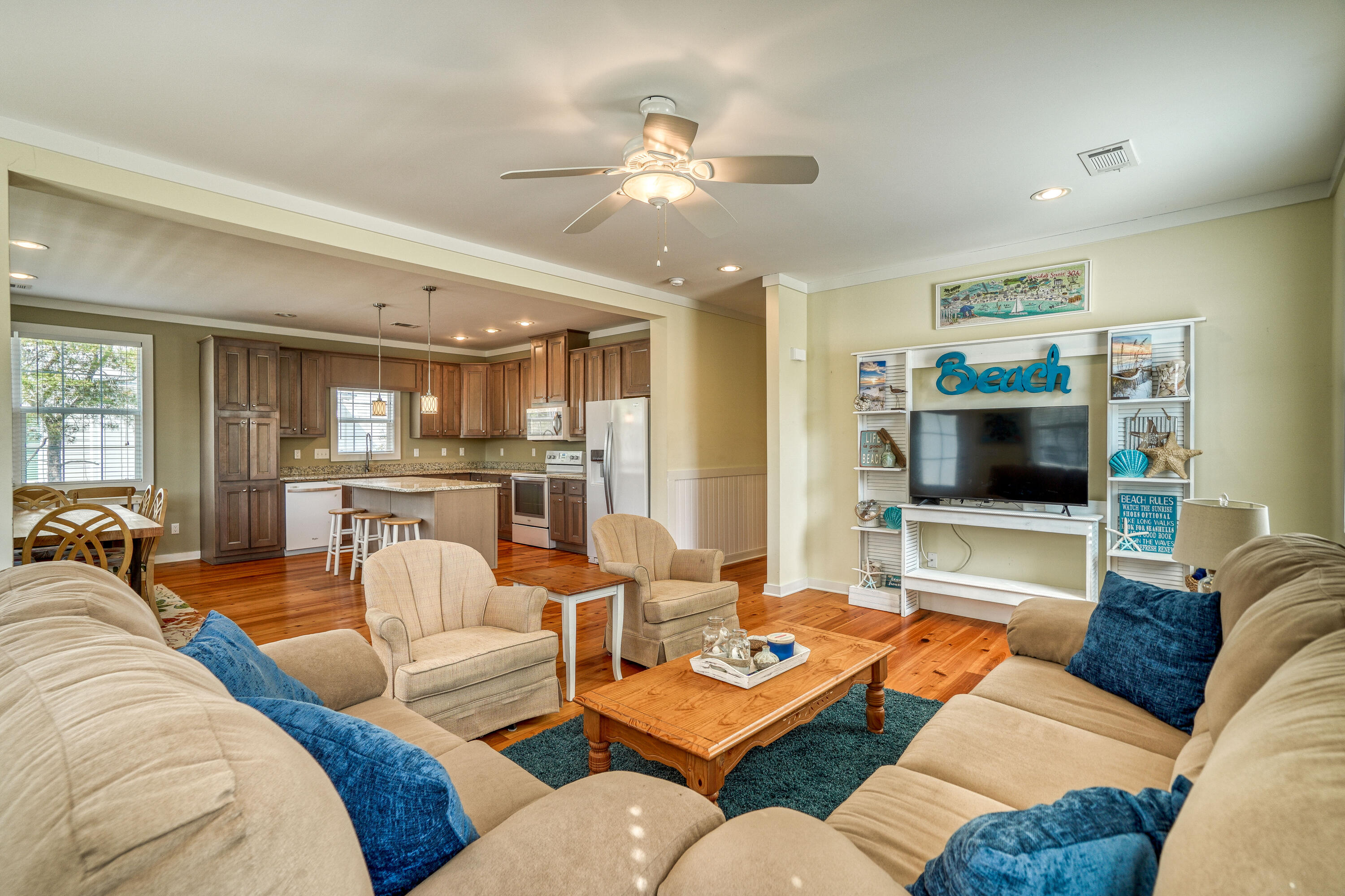 195 Maple Street Santa Rosa Beach, FL 32459 - Photo 5 of 29 a living room with furniture and a flat screen tv