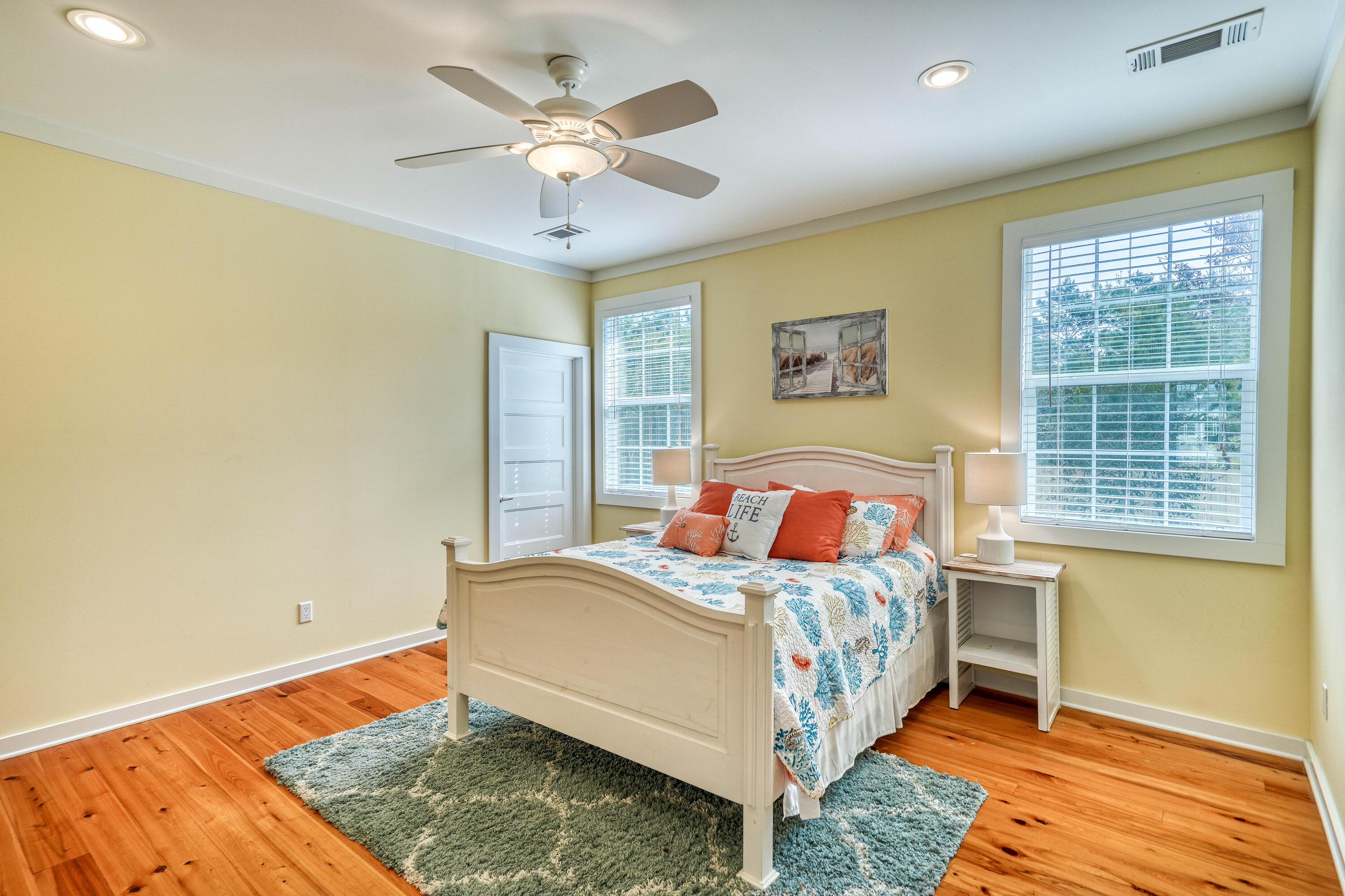 195 Maple Street Santa Rosa Beach, FL 32459 - Photo 9 of 29 a bedroom with a bed and a window