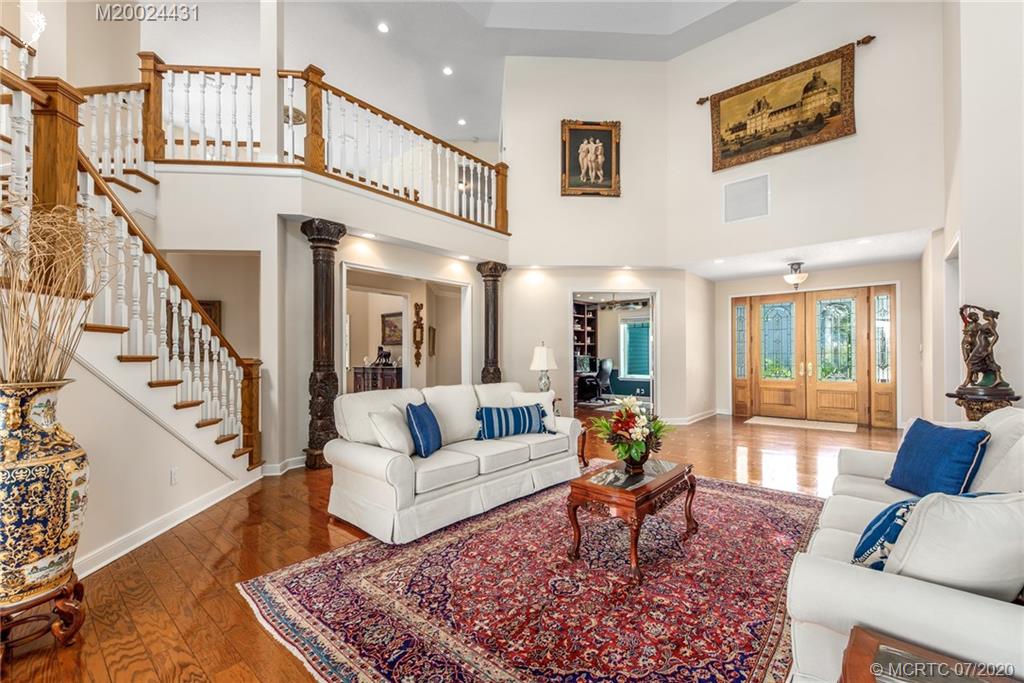 2021 Southeast Riverside Drive Stuart, FL 34996 - Photo 13 of 47 a living room with furniture and a rug