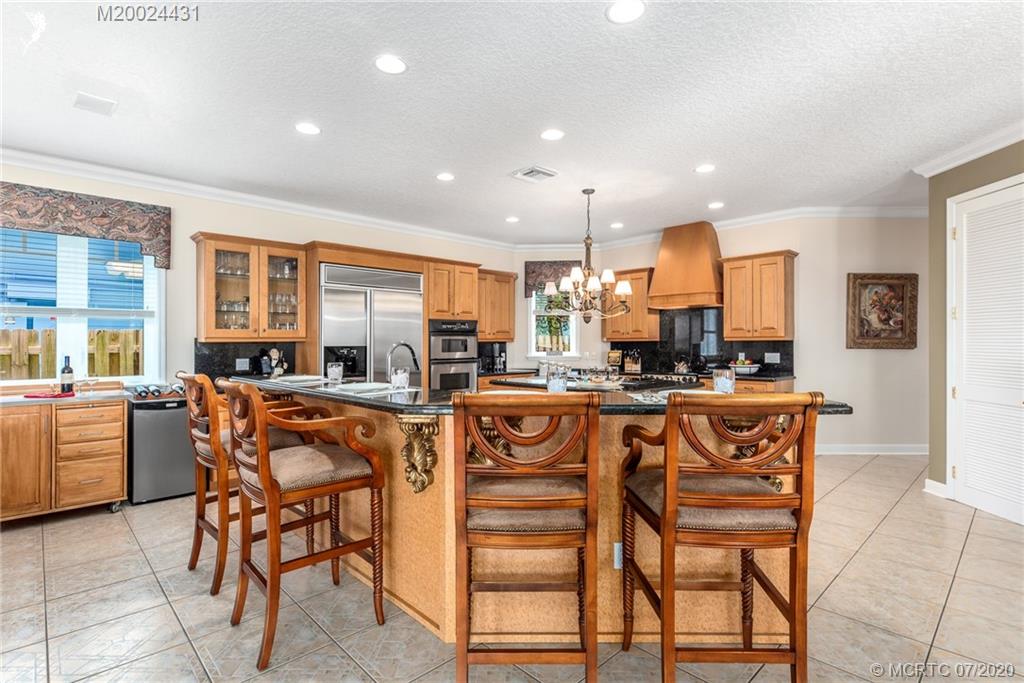 2021 Southeast Riverside Drive Stuart, FL 34996 - Photo 24 of 47 a view of a dining room with furniture