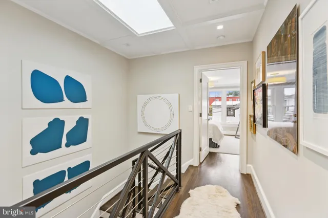 a view of entryway with wooden floor