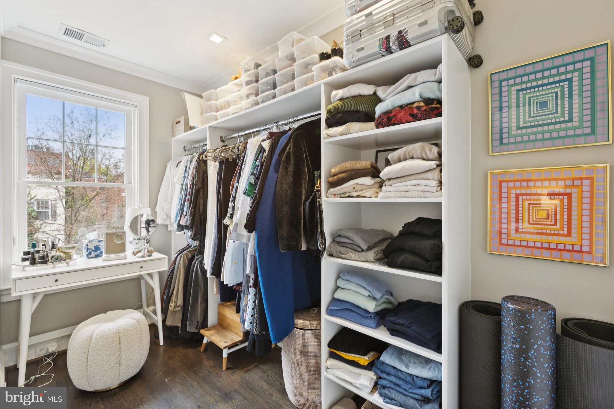 1724 34th Street Northwest Washington, DC 20007 - Photo 15 of 38 a view of walk in closet with clothes and shoes