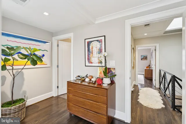 a bed room with furniture and wooden floor