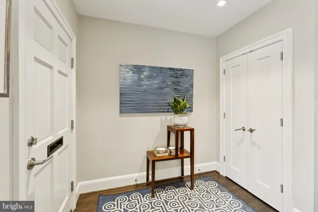 a bathroom with a sink and a window