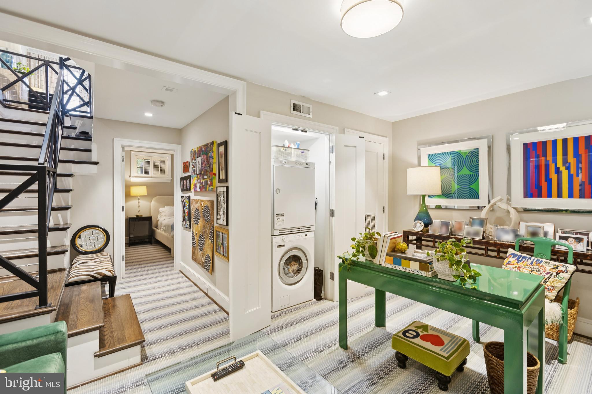 1724 34th Street Northwest Washington, DC 20007 - Photo 23 of 38 a living room with furniture and a book shelf