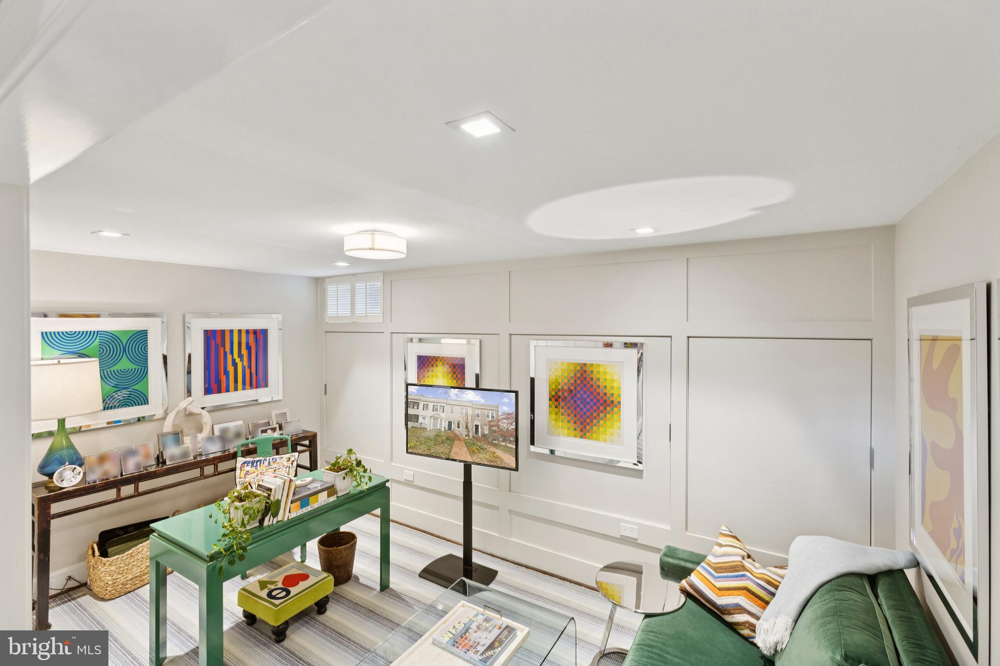 1724 34th Street Northwest Washington, DC 20007 - Photo 25 of 38 a bedroom with furniture and a wooden floor