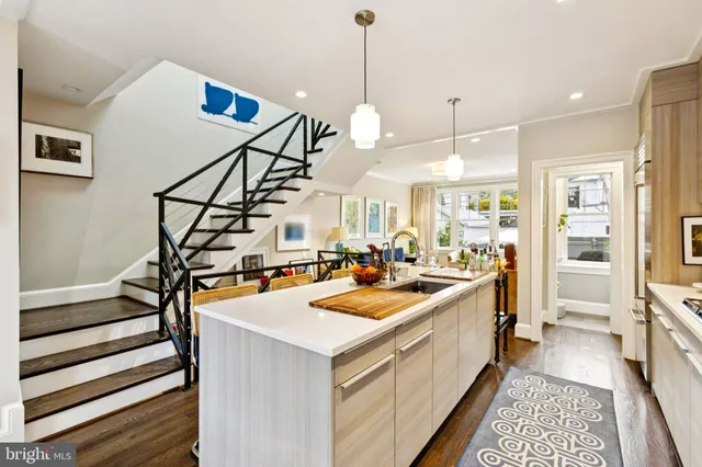 a view of a kitchen and sink