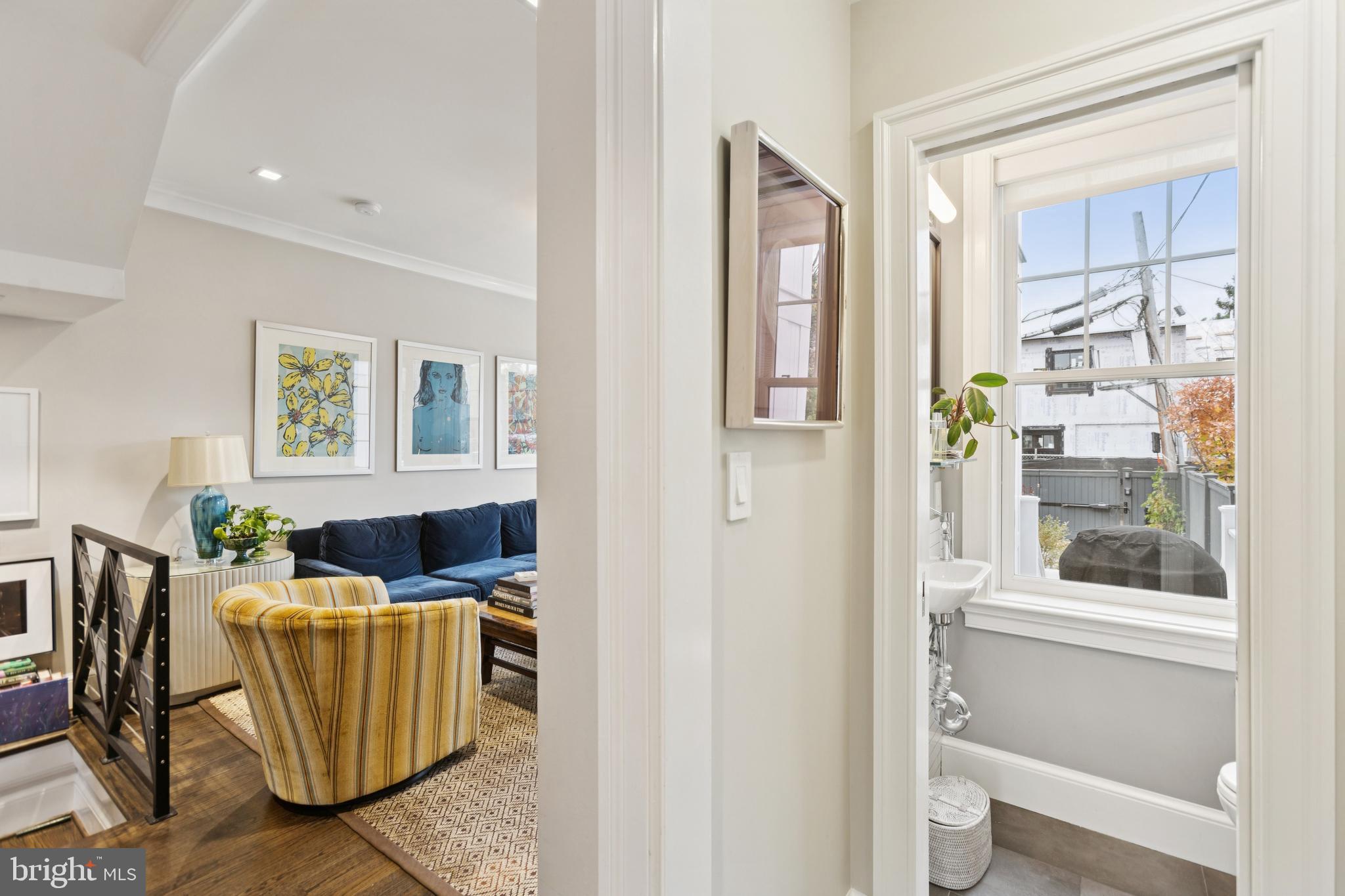 1724 34th Street Northwest Washington, DC 20007 - Photo 6 of 38 a living room with furniture and a window